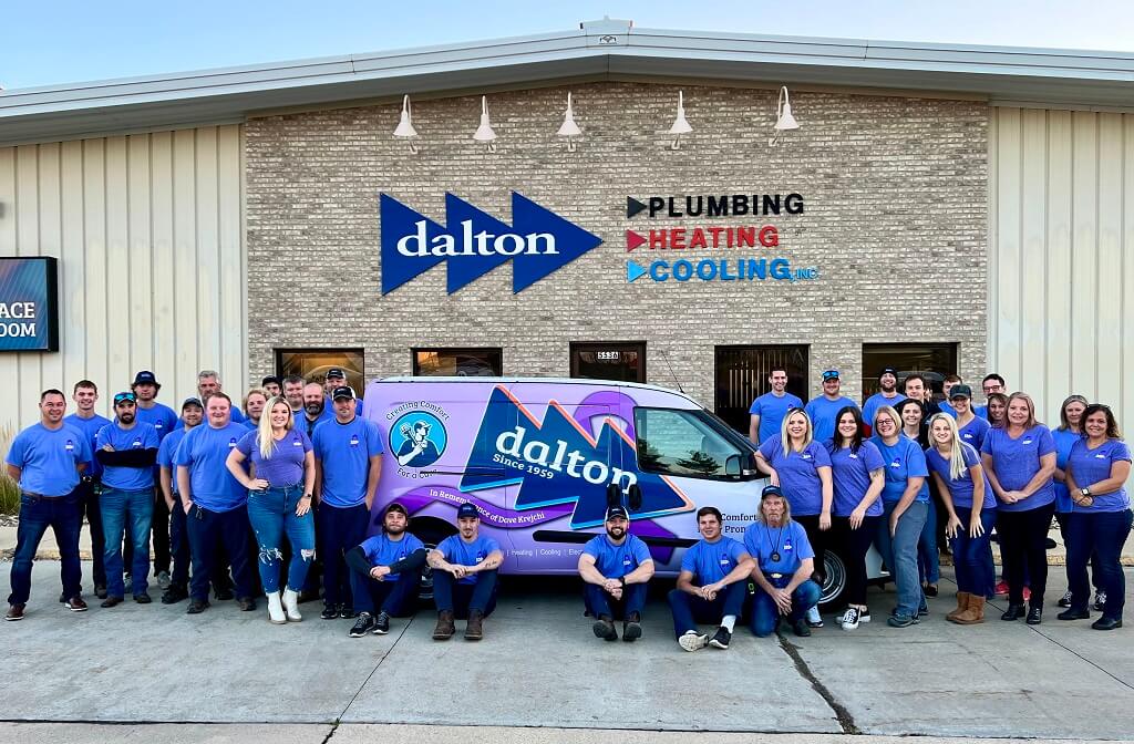 The Dalton Team with the Company Truck in Front of the Company Building