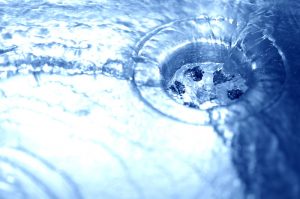 water running down a drain