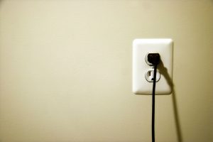 electrical outlet with plug in it