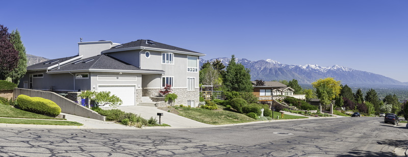 beautiful home with mountain view in background