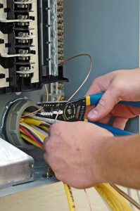 technician-hands-working-on-wires