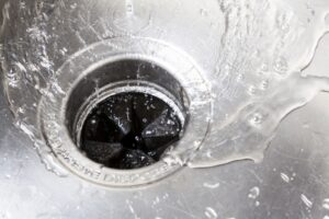 sink-drain-with-water-rushing-down