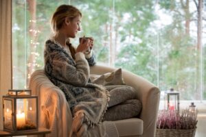 woman-in-chair-enjoying-warmth