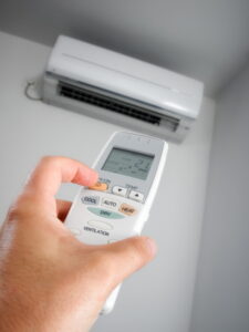 hand-holding-remote-for-ductless-system