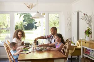 family-sitting-around-table